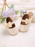 Baby Apricot Shiny Side Bow Flats
