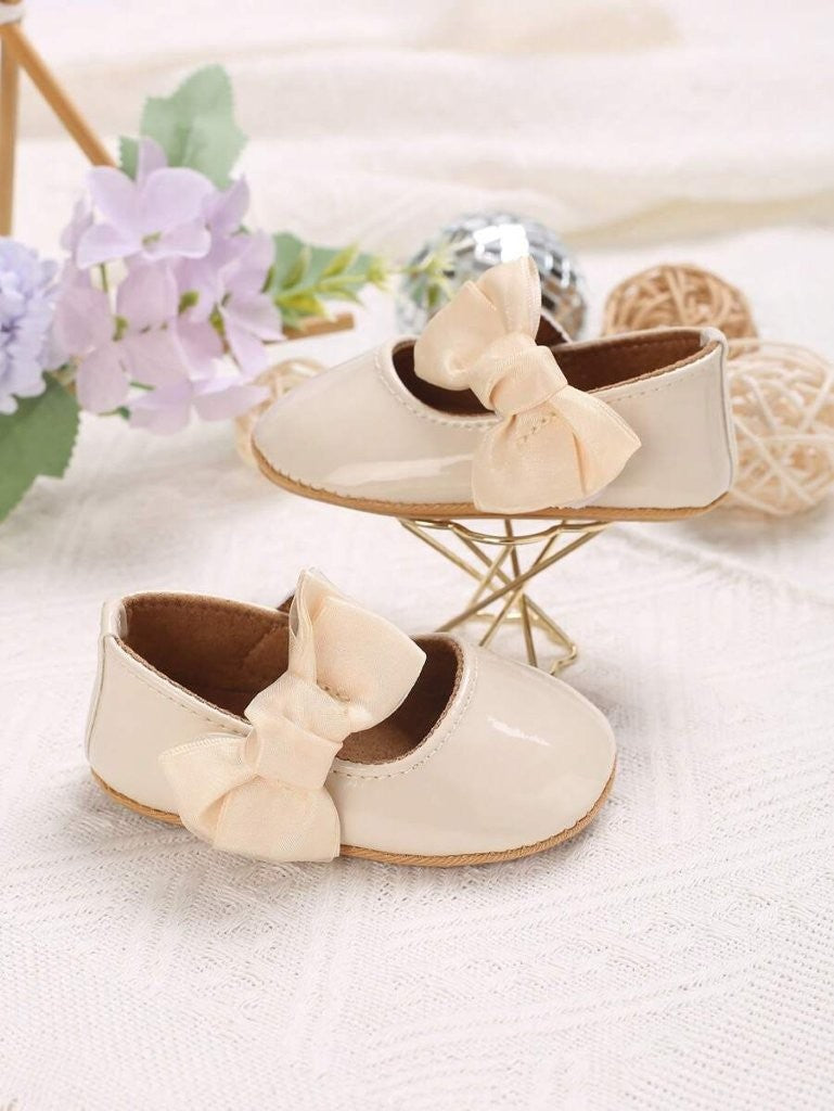 Baby Apricot Shiny Side Bow Flats