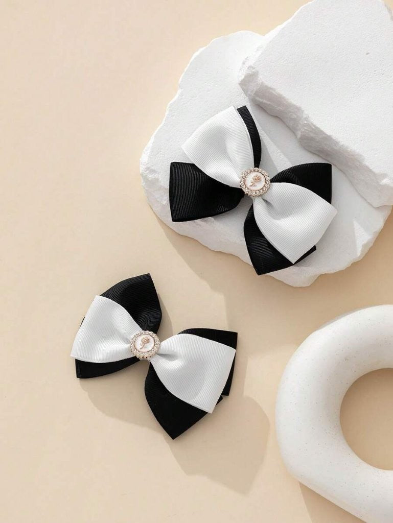 2 Piece Diamante Rose Hairclips Black And White