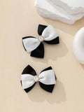 2 Piece Diamante Rose Hairclips Black And White