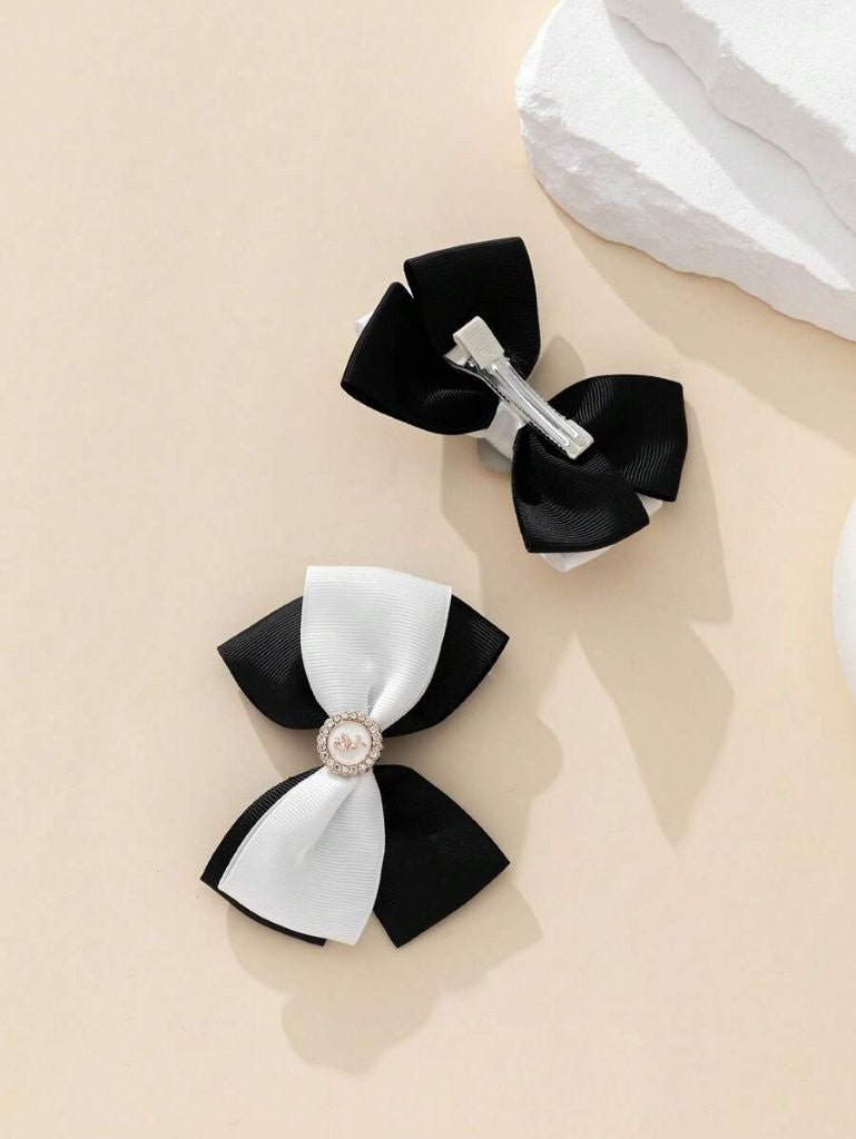 2 Piece Diamante Rose Hairclips Black And White
