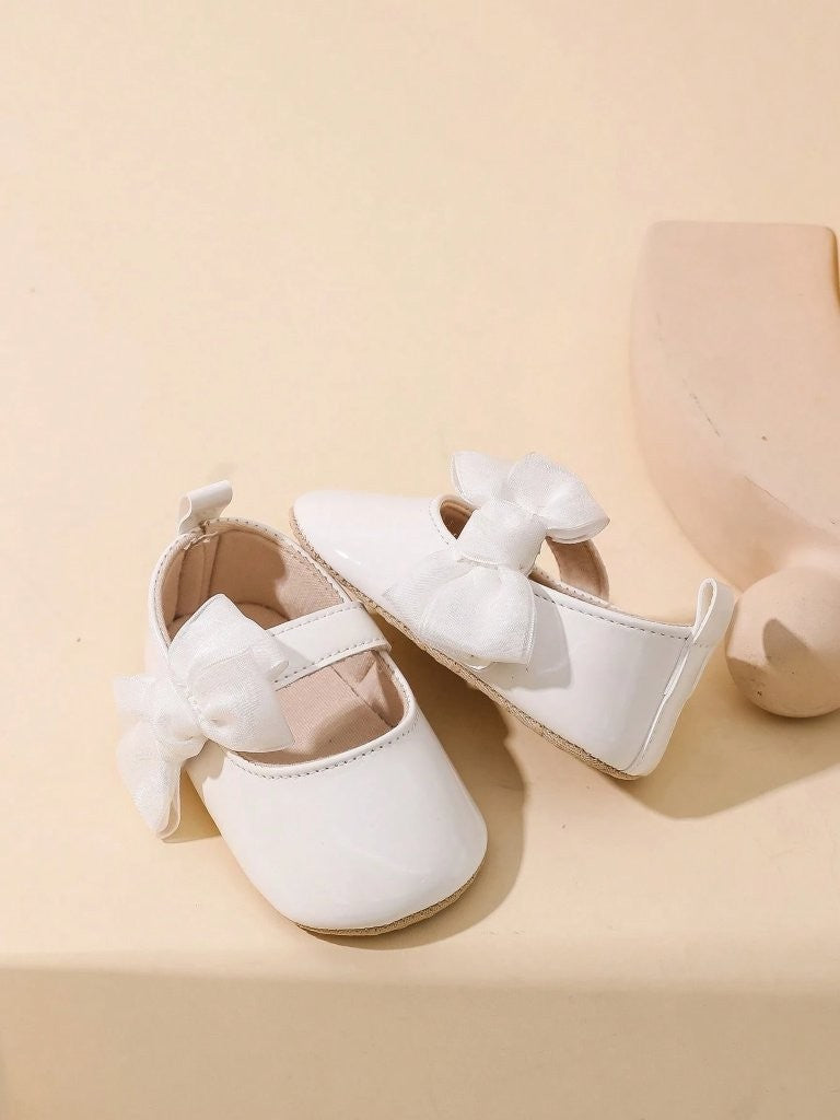 Baby White Shiny Side Bow Flats