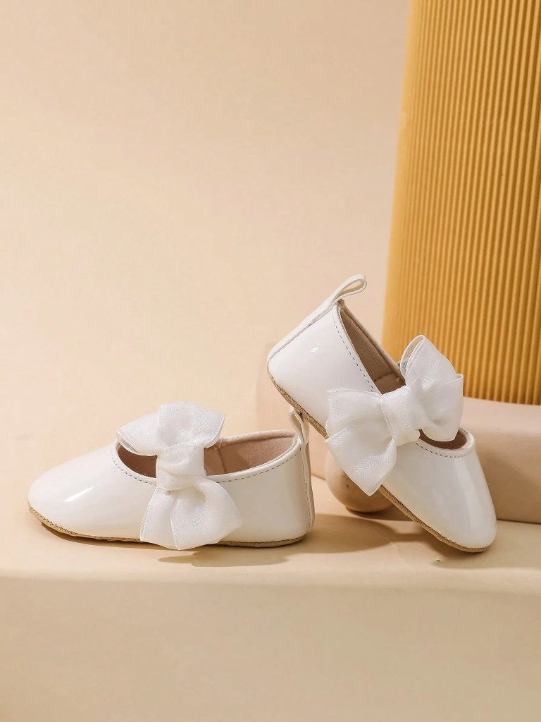 Baby White Shiny Side Bow Flats